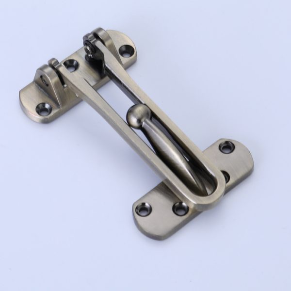 Zinc alloy door guard with hinged security arm and mounting plates